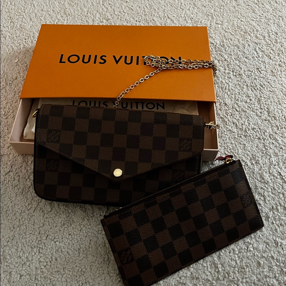 Louis Vuitton crossbody with gold hardware